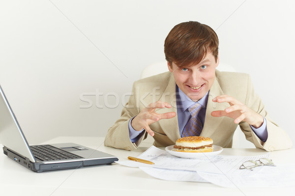 Foto stock: Jóvenes · hambriento · hombre · comer · sándwich · oficina