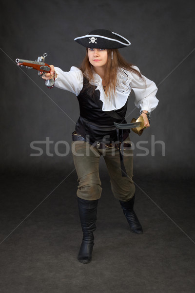 Pirate girl rush to the attack with gun Stock photo © pzaxe