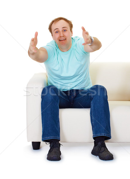 Man sits on couch in despair Stock photo © pzaxe