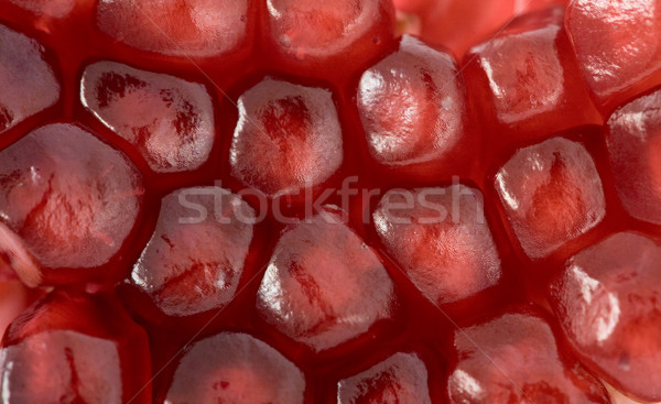 Red grains of pomegranate background Stock photo © pzaxe