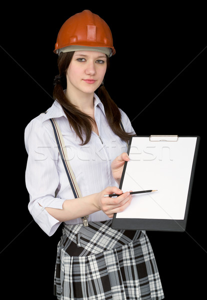 Beautiful girl in a helmet with tablet and pencil Stock photo © pzaxe