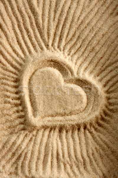  Heart shape on sand  Stock photo © qiun