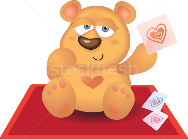 Foto stock: Osito · de · peluche · jugando · corazón · tarjeta · alfombra · roja