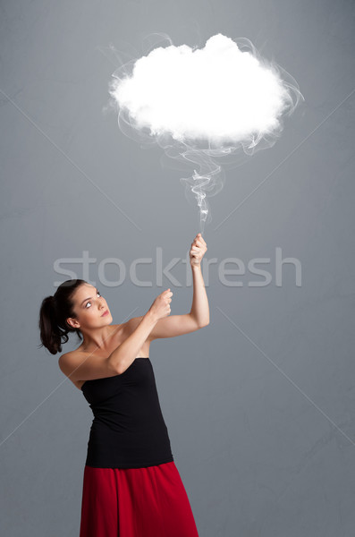 Beautiful lady holding cloud Stock photo © ra2studio