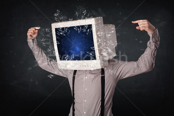 Computer monitor screen exploding on a young persons head  Stock photo © ra2studio
