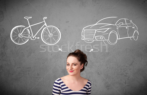 Woman making a choice between bicycle and car Stock photo © ra2studio