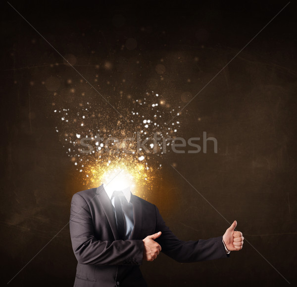 Business man with glowing exploding head Stock photo © ra2studio