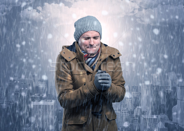 Boy freezing in cold weather with city concept Stock photo © ra2studio