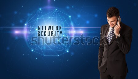 Businessman sitting with crystal ball in action Stock photo © ra2studio