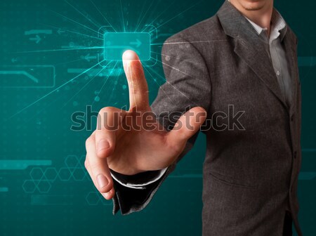 Stock photo: Woman pressing imaginary button