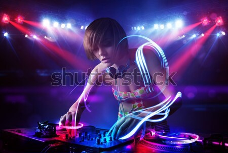 [[stock_photo]]: Disc-jockey · jouer · musique · lumière · poutre · effets