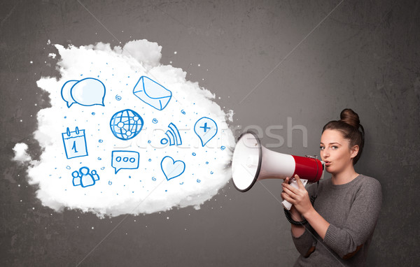 Woman shouting into loudspeaker and modern blue icons and symbol Stock photo © ra2studio