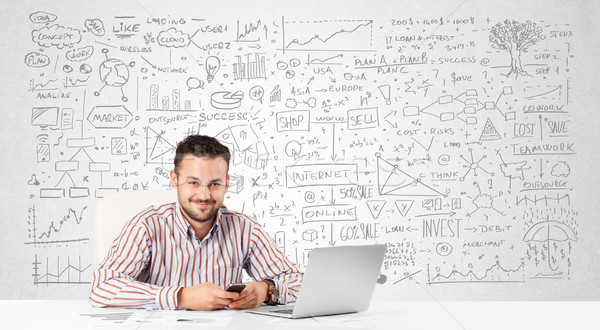 Businessman planning and calculating with various business ideas Stock photo © ra2studio