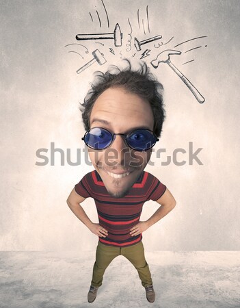 Big head person with drawn hammers Stock photo © ra2studio