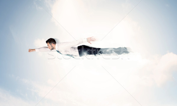 [[stock_photo]]: Homme · d'affaires · battant · comme · nuages · ciel