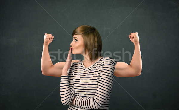 Sterke armen mooie jonge vrouw vrouw achtergrond Stockfoto © ra2studio