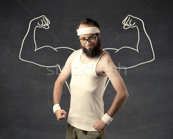Young weak man with drawn muscles Stock photo © ra2studio