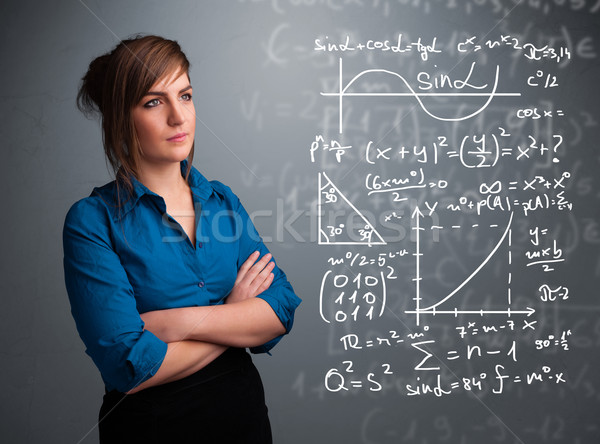 Piękna uczennica myślenia kompleks matematyczny znaki Zdjęcia stock © ra2studio