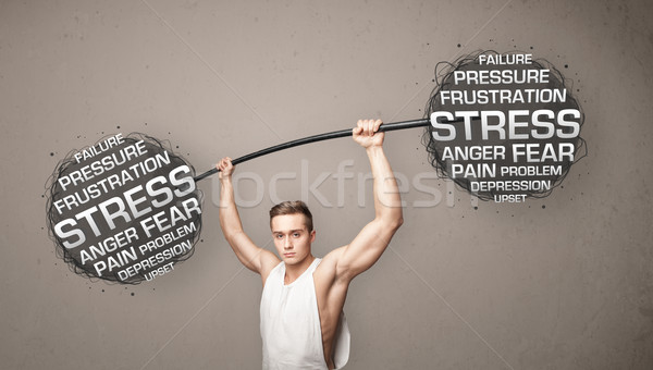 muscular man fighting with stress Stock photo © ra2studio