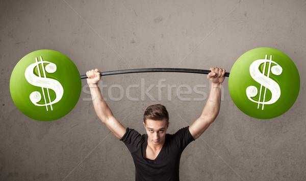 Gespierd man groene dollarteken gewichten Stockfoto © ra2studio