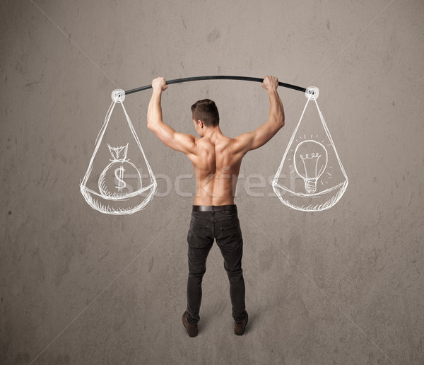 muscular man trying to get balanced  Stock photo © ra2studio