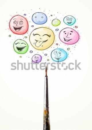 Smiley faces coming out of pen Stock photo © ra2studio