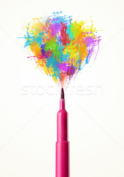Felt pen close-up with colored paint splashes Stock photo © ra2studio