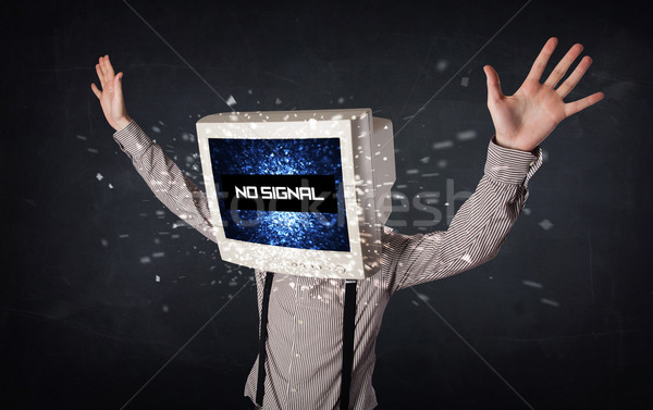 Man with a monitor head, no signal sign on the display Stock photo © ra2studio