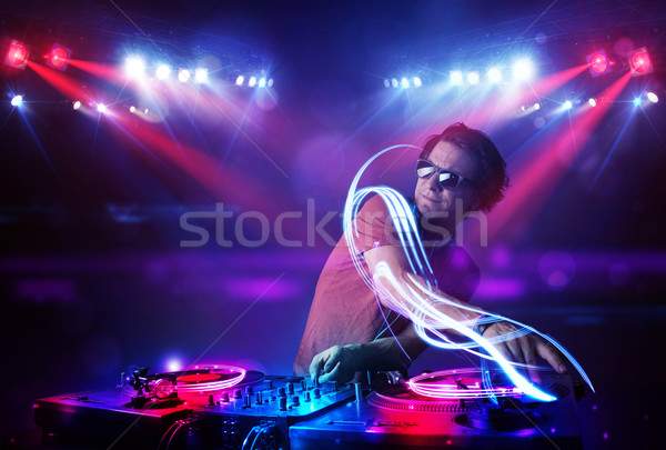 диск-жокей играет музыку свет луч эффекты Сток-фото © ra2studio