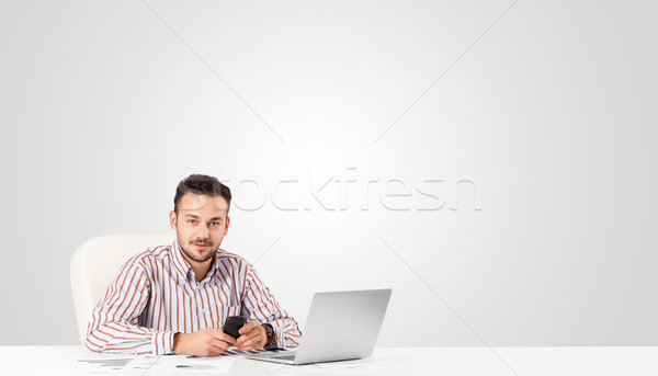 Attractive businessman with plain white copy space Stock photo © ra2studio