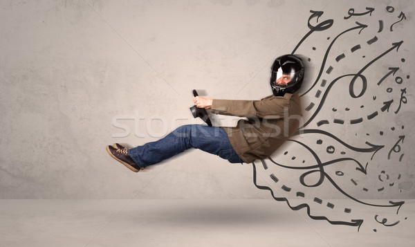 Funny man driving a flying vehicle with hand drawn lines after h Stock photo © ra2studio