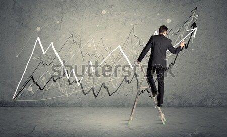 Man on ladder drawing lines Stock photo © ra2studio