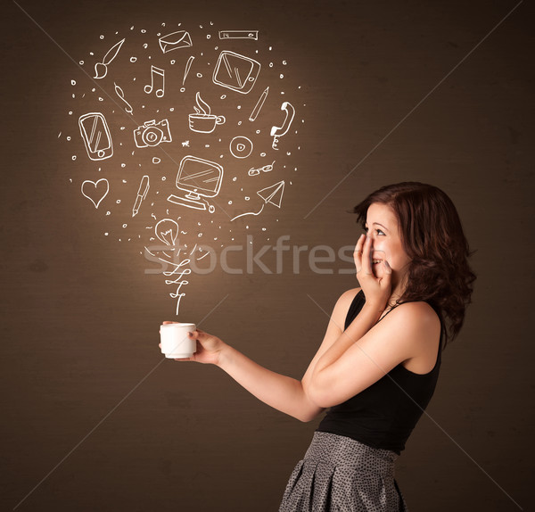 Businesswoman holding a white cup with social media icons Stock photo © ra2studio