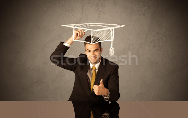 Happy college graduate drawing academic hat Stock photo © ra2studio