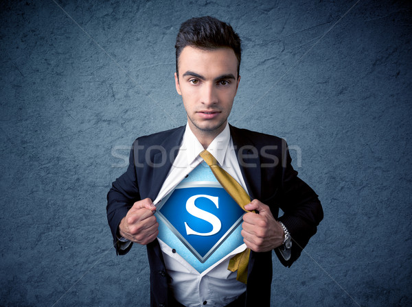 Businessman ripping off his shirt with superhero sign  Stock photo © ra2studio