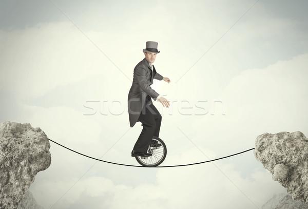 Odważny człowiek biznesu jazda konna cyklu biznesmen Zdjęcia stock © ra2studio
