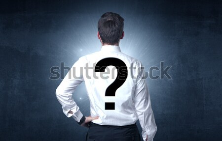 Man standing with question mark on his back Stock photo © ra2studio