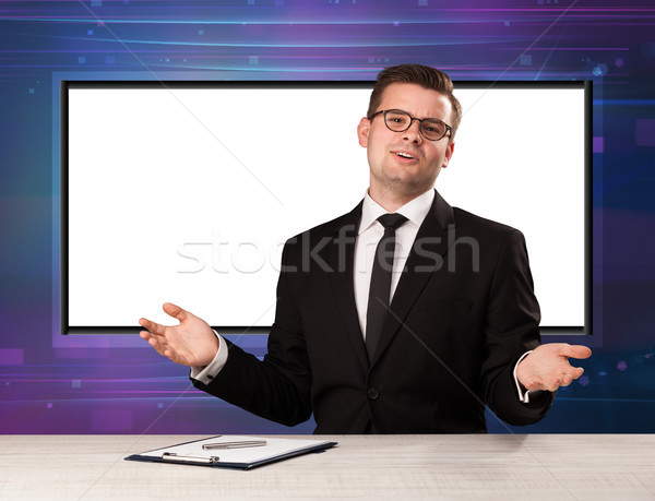 Television program host with big copy screen in his back Stock photo © ra2studio