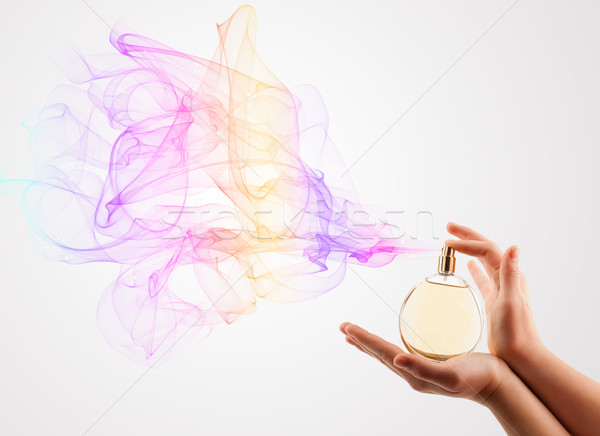 woman hands spraying perfume Stock photo © ra2studio