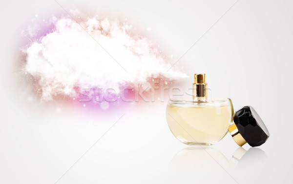 beautiful bottle spraying colorful cloud Stock photo © ra2studio
