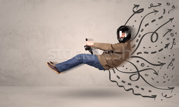Funny man driving a flying vehicle with hand drawn lines after h Stock photo © ra2studio