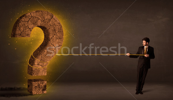 Iş adamı büyük katı soru işareti taş Stok fotoğraf © ra2studio