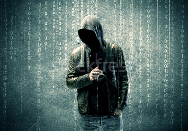 Stock photo: Angry mysterious hacker with numbers