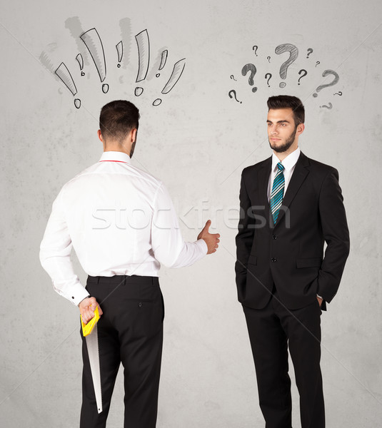Ruthless business handshake Stock photo © ra2studio