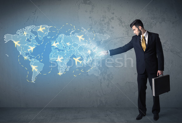 Business person showing digital map with planes around the world Stock photo © ra2studio