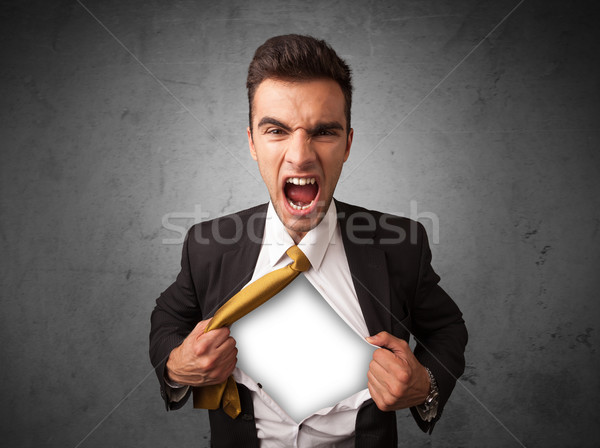 Businessman tearing off his shirt with white copyspace on chest Stock photo © ra2studio