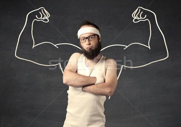 Young weak man with drawn muscles Stock photo © ra2studio