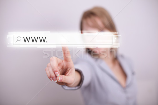 Młodych kobieta interesu dotknąć internetowych przeglądarka adres Zdjęcia stock © ra2studio