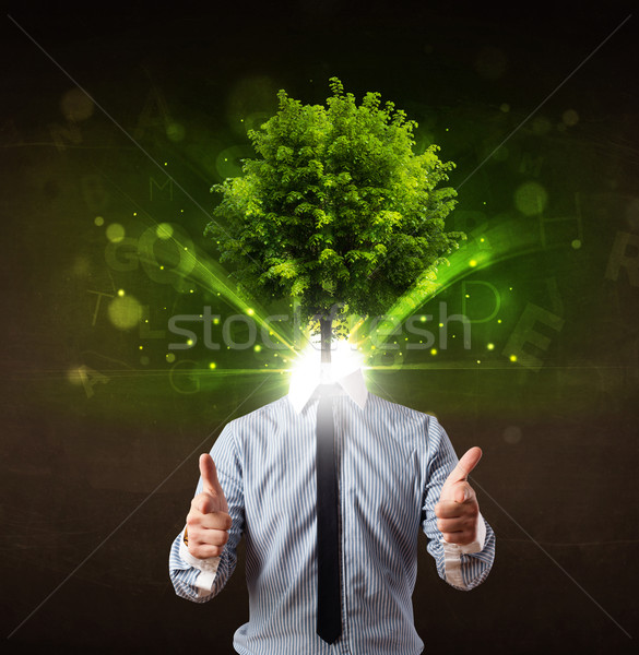 Man with green tree head concept Stock photo © ra2studio