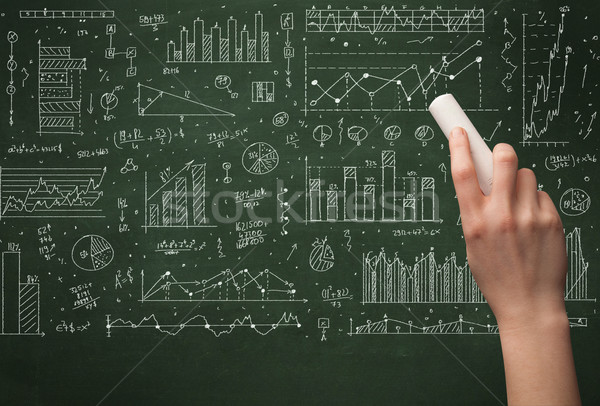 A business person drawing data on chalkboard Stock photo © ra2studio